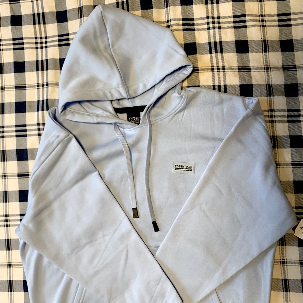 Essential Brand. Size small. Color Blue